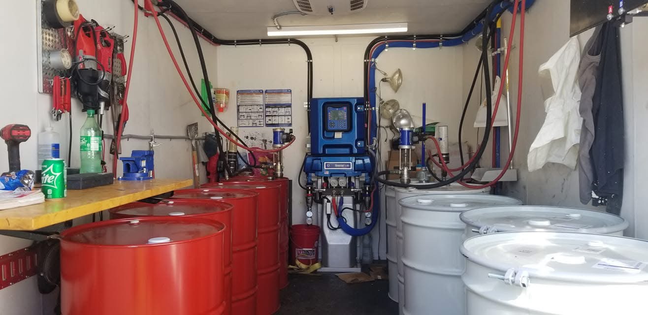 Inside the South Alabama Spray Foam spray rig with professional mixing equipment
